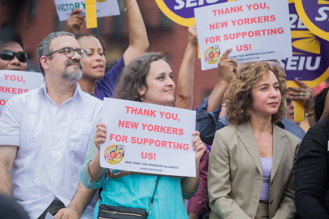 Bhairavi Desai (center), executive director of the New York Taxi Workers Alliance.